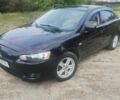 Чорний Міцубісі Lancer, об'ємом двигуна 2 л та пробігом 287 тис. км за 5002 $, фото 1 на Automoto.ua