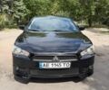 Черный Мицубиси Лансер, объемом двигателя 1.8 л и пробегом 159 тыс. км за 6800 $, фото 1 на Automoto.ua
