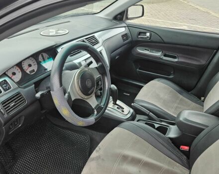 Міцубісі Lancer 2007 у Горішні Плавні (Комсомольськ) на Automoto.ua Чорний Міцубісі Lancer, об'ємом двигуна 2 л та пробігом 237 тис. км за 4300 $, фото 4 на Automoto.ua