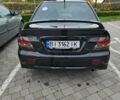 Міцубісі Lancer 2007 у Горішні Плавні (Комсомольськ) на Automoto.ua Чорний Міцубісі Lancer, об'ємом двигуна 2 л та пробігом 237 тис. км за 4300 $, фото 3 на Automoto.ua