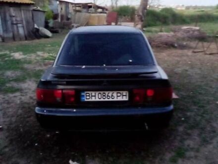 Міцубісі Lancer 1992 у Татарбунари на Automoto.ua Чорний Міцубісі Lancer, об'ємом двигуна 2 л та пробігом 200 тис. км за 800 $, фото 1 на Automoto.ua