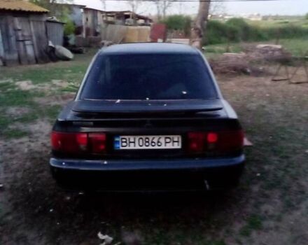 Чорний Міцубісі Lancer, об'ємом двигуна 2 л та пробігом 200 тис. км за 800 $, фото 1 на Automoto.ua