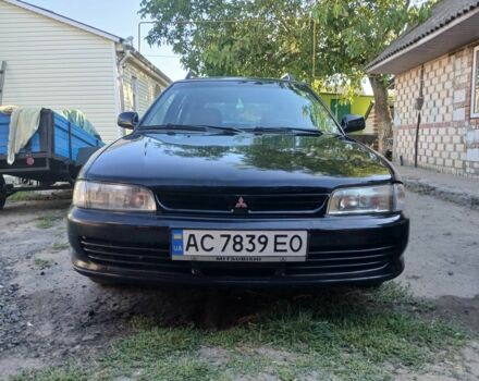 Чорний Міцубісі Lancer, об'ємом двигуна 2 л та пробігом 350 тис. км за 1950 $, фото 1 на Automoto.ua