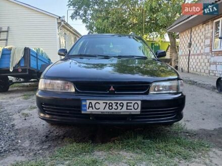 Мицубиси Лансер 1995 в Костополе на Automoto.ua Черный Мицубиси Лансер, объемом двигателя 2 л и пробегом 380 тыс. км за 1700 $, фото 1 на Automoto.ua