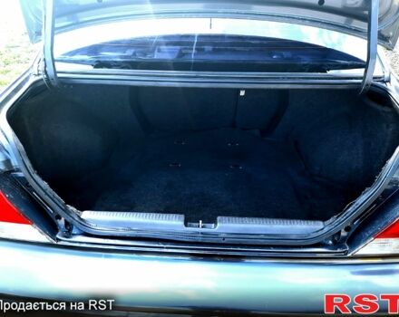 Чорний Міцубісі Lancer, об'ємом двигуна 2 л та пробігом 295 тис. км за 3300 $, фото 1 на Automoto.ua