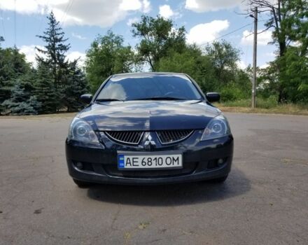 Черный Мицубиси Лансер, объемом двигателя 1.6 л и пробегом 370 тыс. км за 3850 $, фото 1 на Automoto.ua