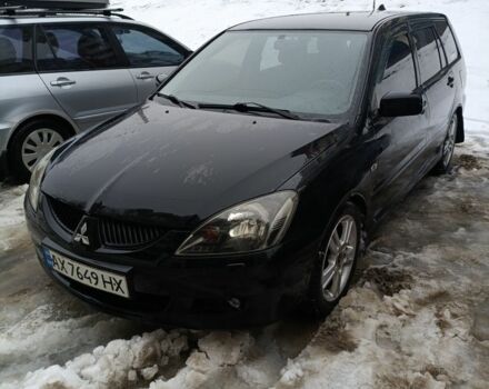 Чорний Міцубісі Lancer, об'ємом двигуна 2 л та пробігом 355 тис. км за 4300 $, фото 1 на Automoto.ua