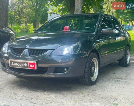 Чорний Міцубісі Lancer, об'ємом двигуна 1.6 л та пробігом 270 тис. км за 6290 $, фото 1 на Automoto.ua