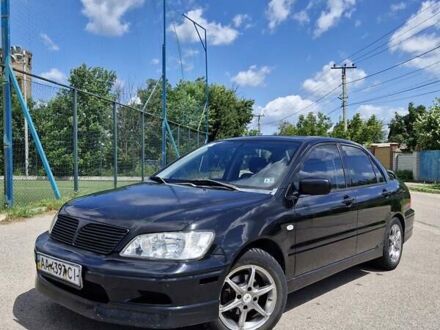 Мицубиси Лансер 2003 в Вышгороде на Automoto.ua Черный Мицубиси Лансер, объемом двигателя 2 л и пробегом 208 тыс. км за 2600 $, фото 1 на Automoto.ua