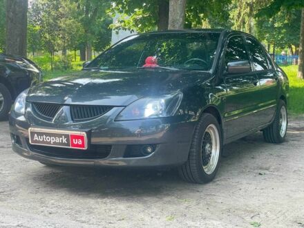 Міцубісі Lancer 2003 у Києві на Automoto.ua Чорний Міцубісі Lancer, об'ємом двигуна 1.6 л та пробігом 270 тис. км за 6490 $, фото 1 на Automoto.ua