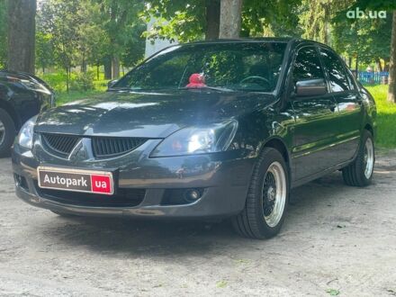 Міцубісі Lancer 2003 у Києві на Automoto.ua Чорний Міцубісі Lancer, об'ємом двигуна 1.6 л та пробігом 270 тис. км за 6490 $, фото 1 на Automoto.ua