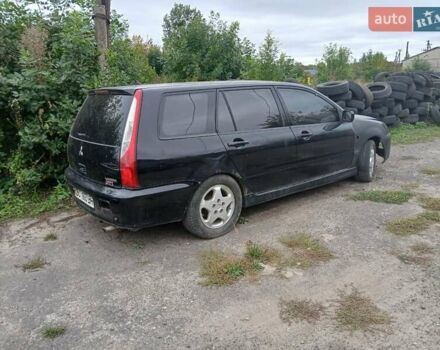 Чорний Міцубісі Lancer, об'ємом двигуна 2 л та пробігом 250 тис. км за 1850 $, фото 1 на Automoto.ua