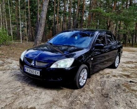 Чорний Міцубісі Lancer, об'ємом двигуна 1.58 л та пробігом 272 тис. км за 2999 $, фото 1 на Automoto.ua