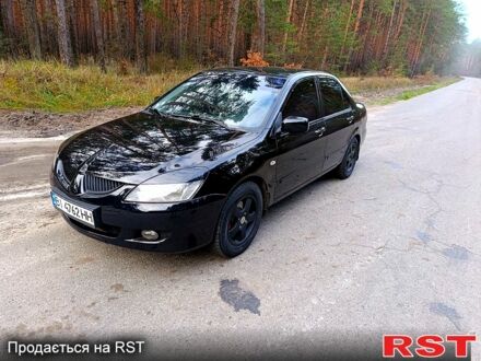 Черный Мицубиси Лансер, объемом двигателя 1.5 л и пробегом 277 тыс. км за 3999 $, фото 1 на Automoto.ua