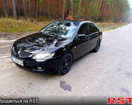 Черный Мицубиси Лансер, объемом двигателя 1.5 л и пробегом 277 тыс. км за 3999 $, фото 1 на Automoto.ua