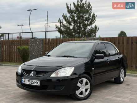 Міцубісі Lancer 2004 у Івано-Франківську на Automoto.ua Чорний Міцубісі Lancer, об'ємом двигуна 1.6 л та пробігом 181 тис. км за 3600 $, фото 1 на Automoto.ua