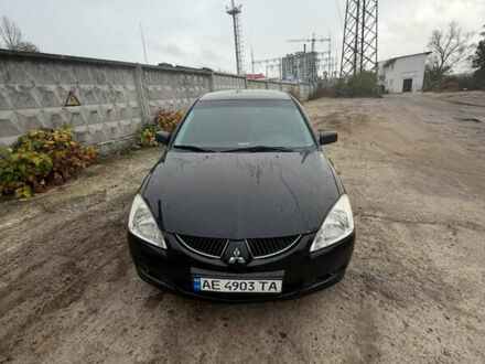 Чорний Міцубісі Lancer, об'ємом двигуна 1.58 л та пробігом 229 тис. км за 3700 $, фото 1 на Automoto.ua