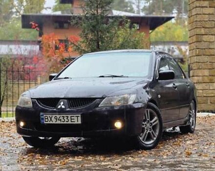 Чорний Міцубісі Lancer, об'ємом двигуна 2 л та пробігом 320 тис. км за 5700 $, фото 1 на Automoto.ua