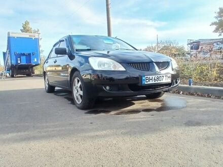 Міцубісі Lancer 2004 у Березовке на Automoto.ua Чорний Міцубісі Lancer, об'ємом двигуна 1.6 л та пробігом 178 тис. км за 2616 $, фото 1 на Automoto.ua