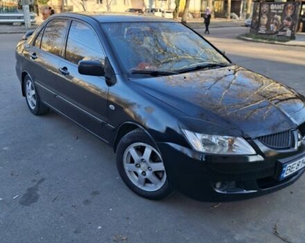 Чорний Міцубісі Lancer, об'ємом двигуна 1.6 л та пробігом 230 тис. км за 3300 $, фото 1 на Automoto.ua