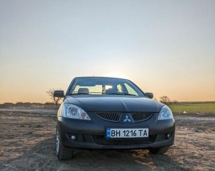 Черный Мицубиси Лансер, объемом двигателя 1.58 л и пробегом 362 тыс. км за 4600 $, фото 1 на Automoto.ua