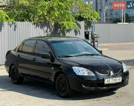 Чорний Міцубісі Lancer, об'ємом двигуна 1.58 л та пробігом 580 тис. км за 1700 $, фото 1 на Automoto.ua