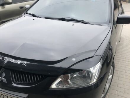 Чорний Міцубісі Lancer, об'ємом двигуна 1.6 л та пробігом 200 тис. км за 5700 $, фото 1 на Automoto.ua