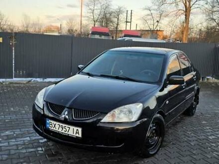 Мицубиси Лансер 2004 в Хмельницком на Automoto.ua Черный Мицубиси Лансер, объемом двигателя 1.58 л и пробегом 348 тыс. км за 4200 $, фото 1 на Automoto.ua