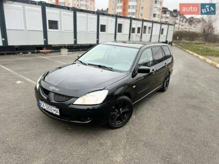 Міцубісі Lancer 2004 у Буче на Automoto.ua Чорний Міцубісі Lancer, об'ємом двигуна 2 л та пробігом 333 тис. км за 3300 $, фото 1 на Automoto.ua