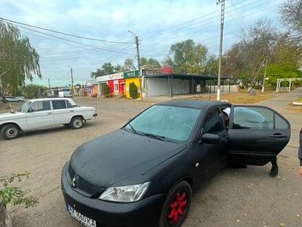 Чорний Міцубісі Lancer, об'ємом двигуна 1.6 л та пробігом 382 тис. км за 3200 $, фото 1 на Automoto.ua