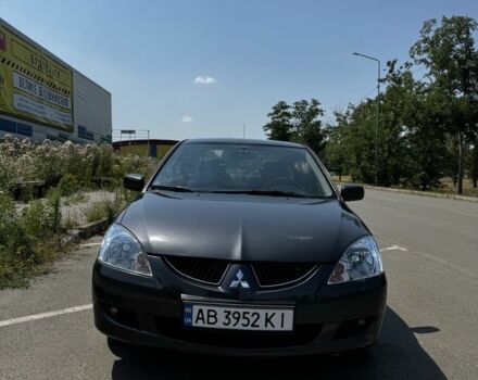 Чорний Міцубісі Lancer, об'ємом двигуна 1.6 л та пробігом 288 тис. км за 5500 $, фото 1 на Automoto.ua