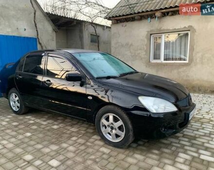 Чорний Міцубісі Lancer, об'ємом двигуна 1.6 л та пробігом 121 тис. км за 3900 $, фото 1 на Automoto.ua