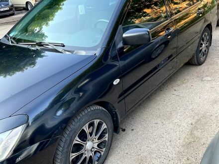 Міцубісі Lancer 2004 у Белой Церкве на Automoto.ua Чорний Міцубісі Lancer, об'ємом двигуна 1.6 л та пробігом 280 тис. км за 3000 $, фото 1 на Automoto.ua