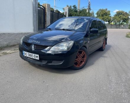 Чорний Міцубісі Lancer, об'ємом двигуна 2 л та пробігом 175 тис. км за 3600 $, фото 1 на Automoto.ua
