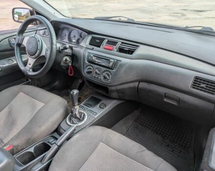 Чорний Міцубісі Lancer, об'ємом двигуна 2 л та пробігом 200 тис. км за 500 $, фото 1 на Automoto.ua