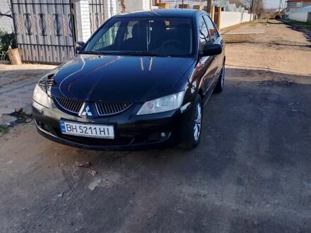 Мицубиси Лансер 2004 в Измаиле на Automoto.ua Черный Мицубиси Лансер, объемом двигателя 1.58 л и пробегом 275 тыс. км за 4200 $, фото 1 на Automoto.ua