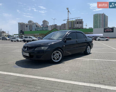 Чорний Міцубісі Lancer, об'ємом двигуна 2 л та пробігом 286 тис. км за 5900 $, фото 1 на Automoto.ua