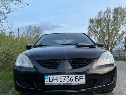 Міцубісі Lancer 2004 у Березовке на Automoto.ua Чорний Міцубісі Lancer, об'ємом двигуна 1.6 л та пробігом 600 тис. км за 4000 $, фото 1 на Automoto.ua
