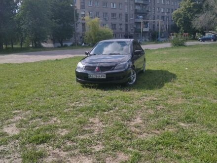 Міцубісі Lancer 2005 у Кам'янське (Дніпродзержинськ) на Automoto.ua Чорний Міцубісі Lancer, об'ємом двигуна 2 л та пробігом 300 тис. км за 5200 $, фото 1 на Automoto.ua