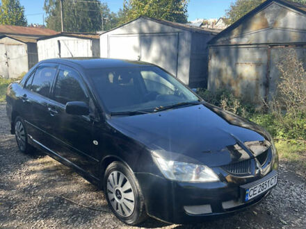 Чорний Міцубісі Lancer, об'ємом двигуна 1.6 л та пробігом 289 тис. км за 2850 $, фото 1 на Automoto.ua