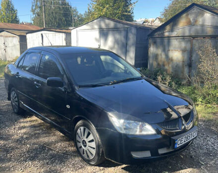 Чорний Міцубісі Lancer, об'ємом двигуна 1.6 л та пробігом 289 тис. км за 2850 $, фото 1 на Automoto.ua