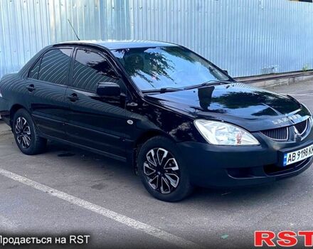 Чорний Міцубісі Lancer, об'ємом двигуна 1.6 л та пробігом 260 тис. км за 3500 $, фото 1 на Automoto.ua