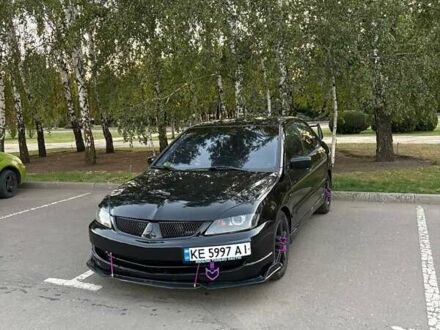 Мицубиси Лансер 2005 в Кривом Роге на Automoto.ua Черный Мицубиси Лансер, объемом двигателя 2 л и пробегом 342 тыс. км за 5000 $, фото 1 на Automoto.ua