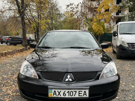 Мицубиси Лансер 2005 в Харькове на Automoto.ua Черный Мицубиси Лансер, объемом двигателя 1.58 л и пробегом 341 тыс. км за 3950 $, фото 1 на Automoto.ua