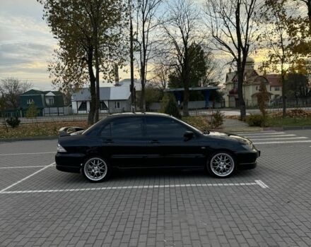 Чорний Міцубісі Lancer, об'ємом двигуна 2 л та пробігом 270 тис. км за 5200 $, фото 1 на Automoto.ua