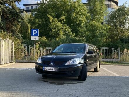 Чорний Міцубісі Lancer, об'ємом двигуна 1.6 л та пробігом 460 тис. км за 2349 $, фото 1 на Automoto.ua
