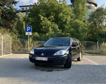 Чорний Міцубісі Lancer, об'ємом двигуна 1.6 л та пробігом 460 тис. км за 2349 $, фото 1 на Automoto.ua
