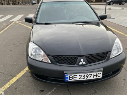 Черный Мицубиси Лансер, объемом двигателя 1.6 л и пробегом 350 тыс. км за 2900 $, фото 1 на Automoto.ua