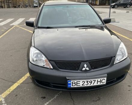 Черный Мицубиси Лансер, объемом двигателя 1.6 л и пробегом 350 тыс. км за 2900 $, фото 1 на Automoto.ua