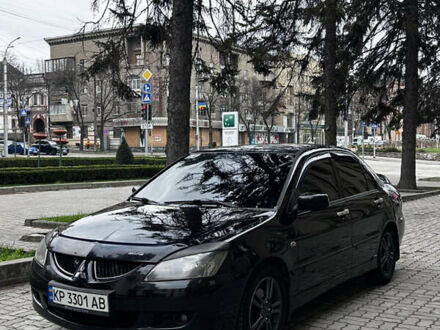 Міцубісі Lancer 2005 у Запоріжжя на Automoto.ua Чорний Міцубісі Lancer, об'ємом двигуна 2 л та пробігом 210 тис. км за 5300 $, фото 1 на Automoto.ua